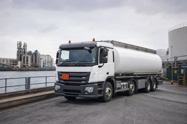 Fuel Tanker Near Industrial Waterways in UK Corporate Photography Style-1
