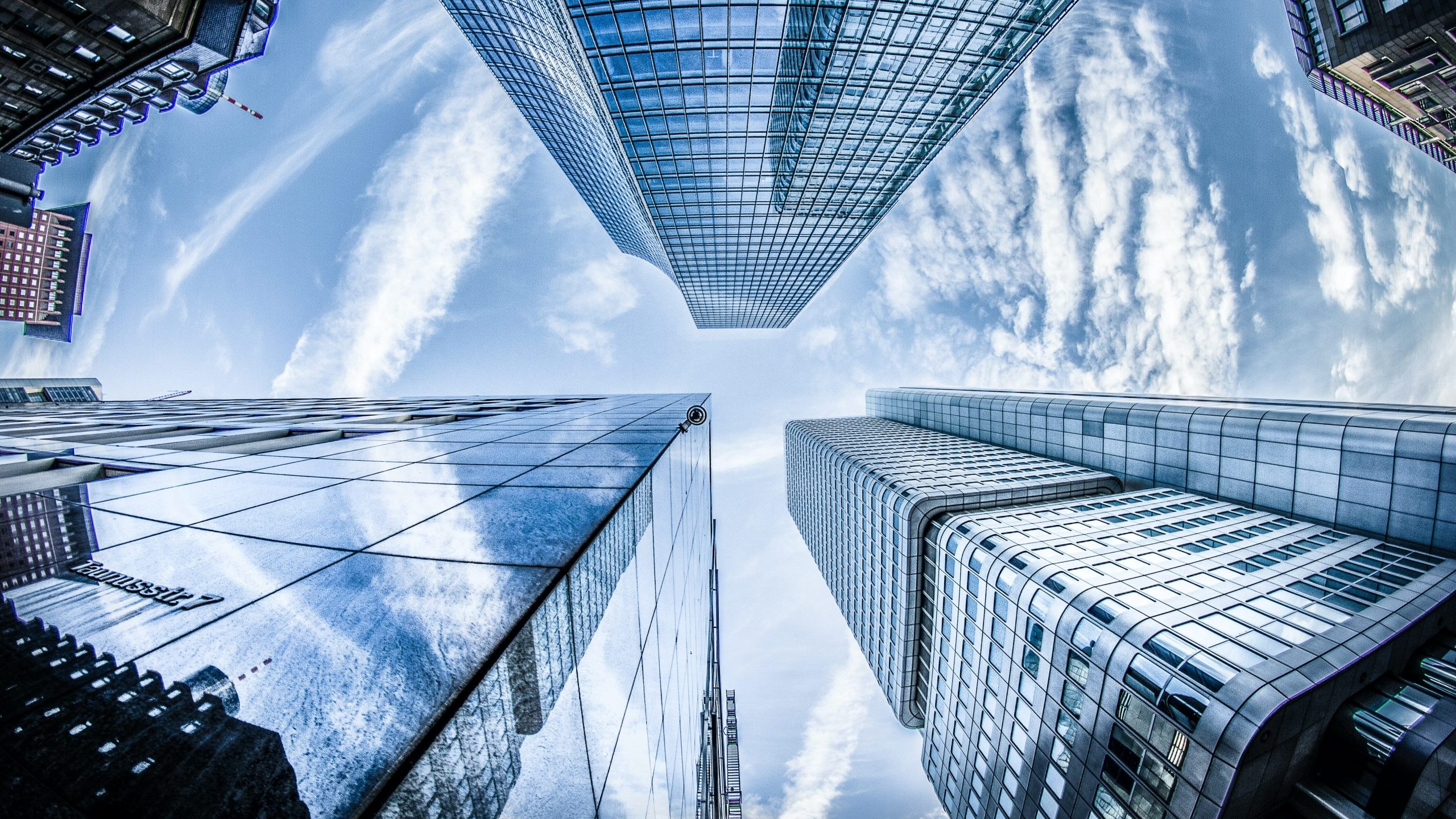 low-angle-photo-of-four-high-rise-curtain-wall-buildings-830891-scaled-e1593097429825
